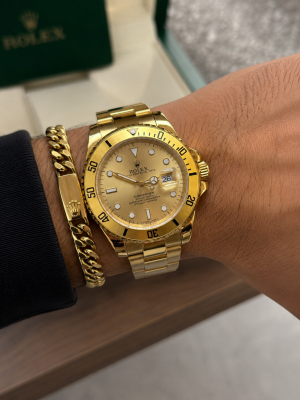 Roleex Oyster Perpetual Submarine Date Gold