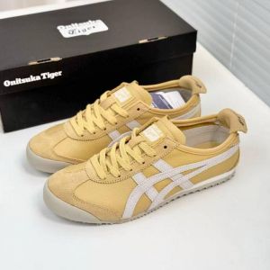 Onitsu Tiger Mexico 66 VIN sneakers in yellow with white stripes.