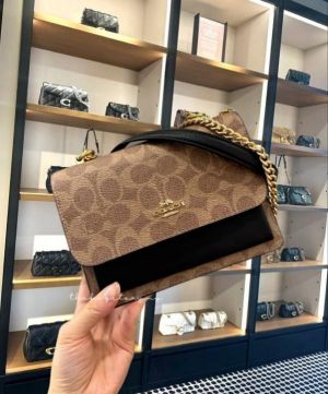 Coacch klare signature monogram crossbody bag with ogbox