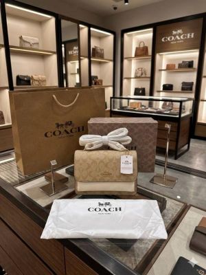 Coacch klare signature monogram crossbody bag with ogbox