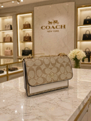 Coacch klare signature monogram crossbody bag with ogbox